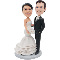 couple in black suit and white wedding dress holding flowers custom figure bobbleheads