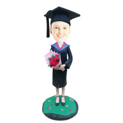 personalized female graduate in black gown and holding flowers custom graduation bobblehead gift