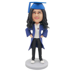 female graduates in dark blue gown and her hands rested on her hips custom graduation bobblehead