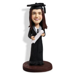 personalized female graduates in black gown and holding a certificate custom graduation bobblehead gift