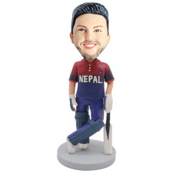 male cricket player in professional uniform with nepal custom cricket bobblehead