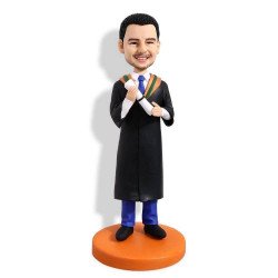 personalized male graduates in black gown and blue pants custom graduation bobblehead gift
