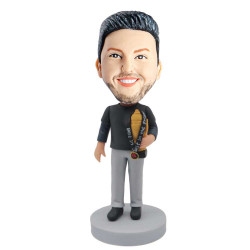 male in black t-shirt and holding the trophy custom figure bobblehead